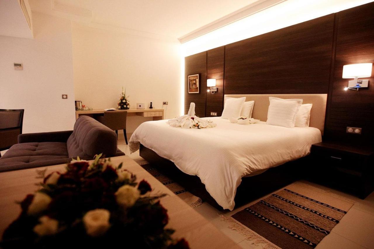 فنادق موفنبيك سفاكس صفاقس‎ المظهر الخارجي الصورة A bedroom at the hotel