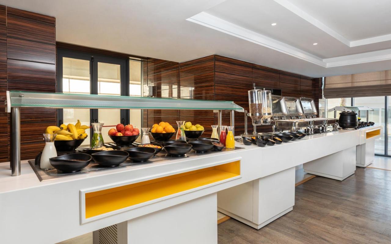 فنادق موفنبيك سفاكس صفاقس‎ المظهر الخارجي الصورة A buffet at a hotel
