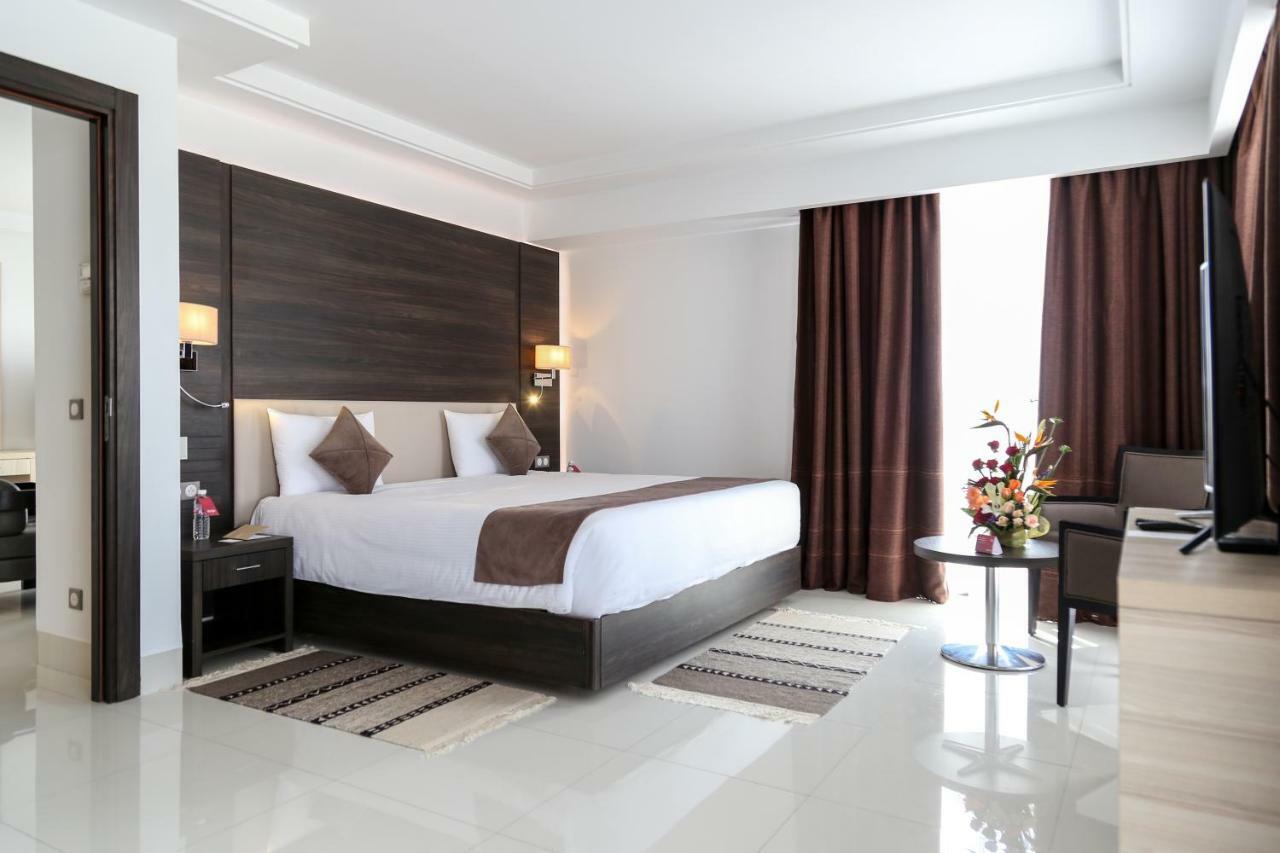 فنادق موفنبيك سفاكس صفاقس‎ المظهر الخارجي الصورة A bedroom at the hotel