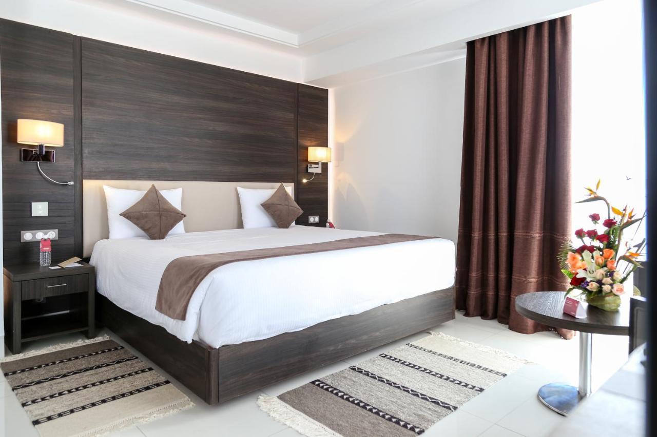 فنادق موفنبيك سفاكس صفاقس‎ المظهر الخارجي الصورة A bedroom at the hotel